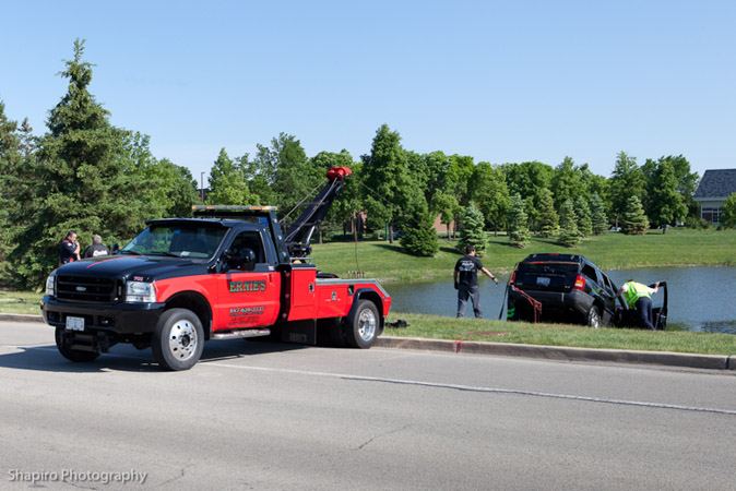 Ernie's Towing recovers a car from a pond in Vernon Hills IL 5-21-12